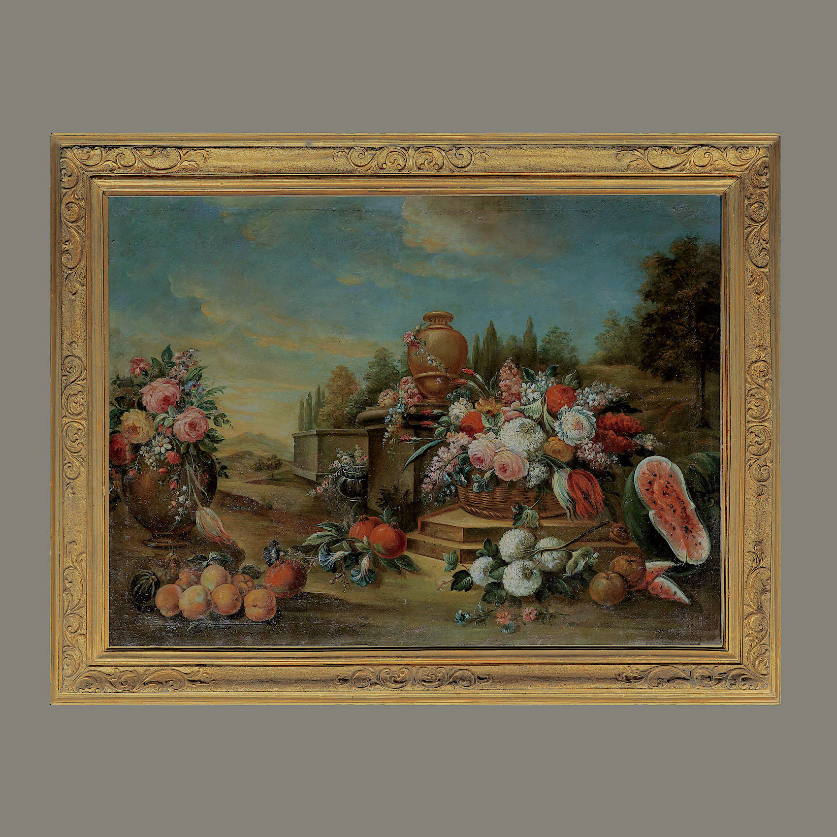 Парные натюрморты. Натюрморт с фруктами, цветами, керамическими вазонами и корзиной на фоне тосканского пейзажа.