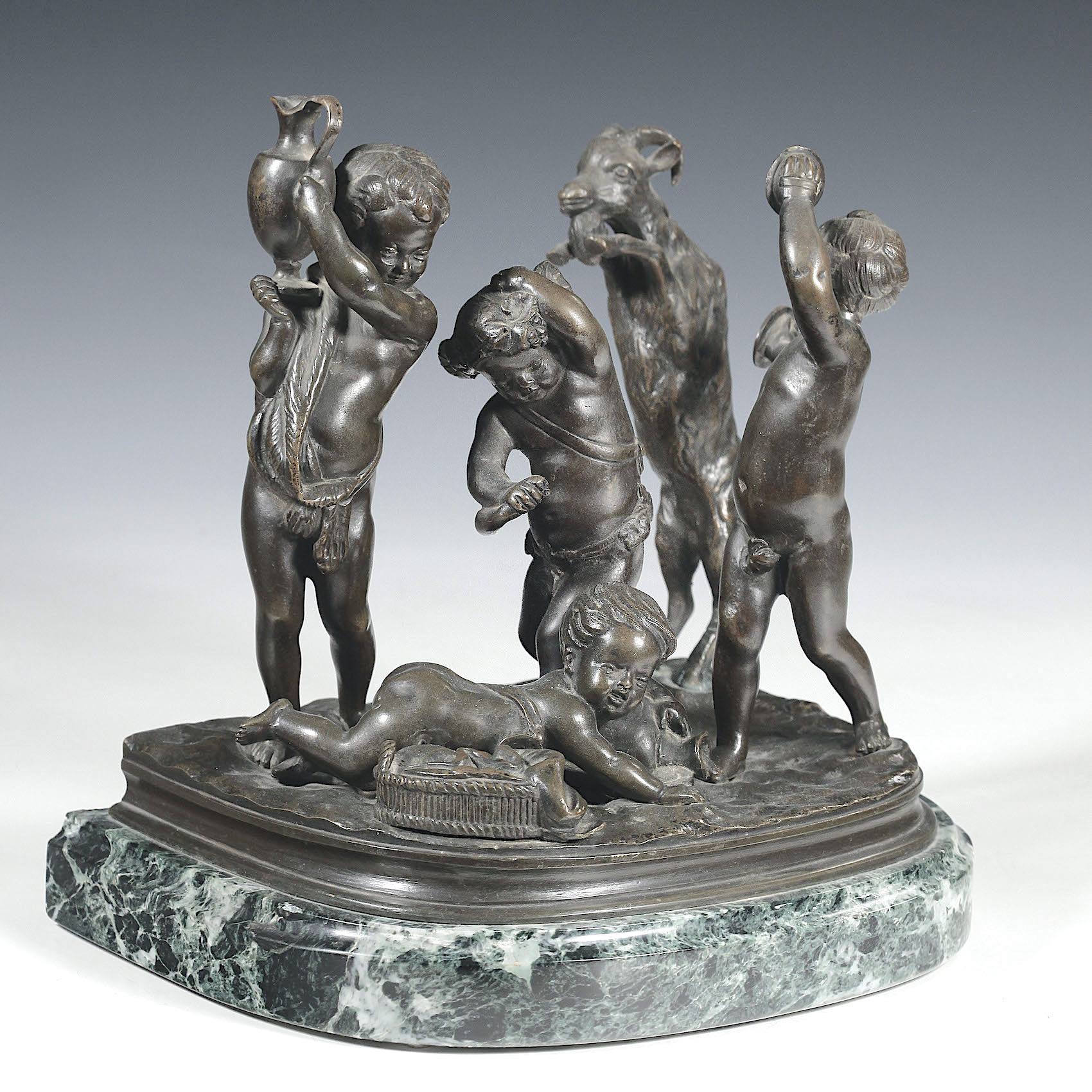 Бронзовая скульптурная композиция «Путти, играющие с козликом» по модели Клода Мишеля Клодиона